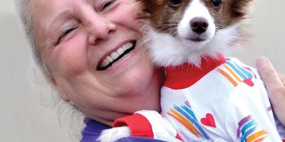 Lucky-Duck-Foundation-Hugging-Dog